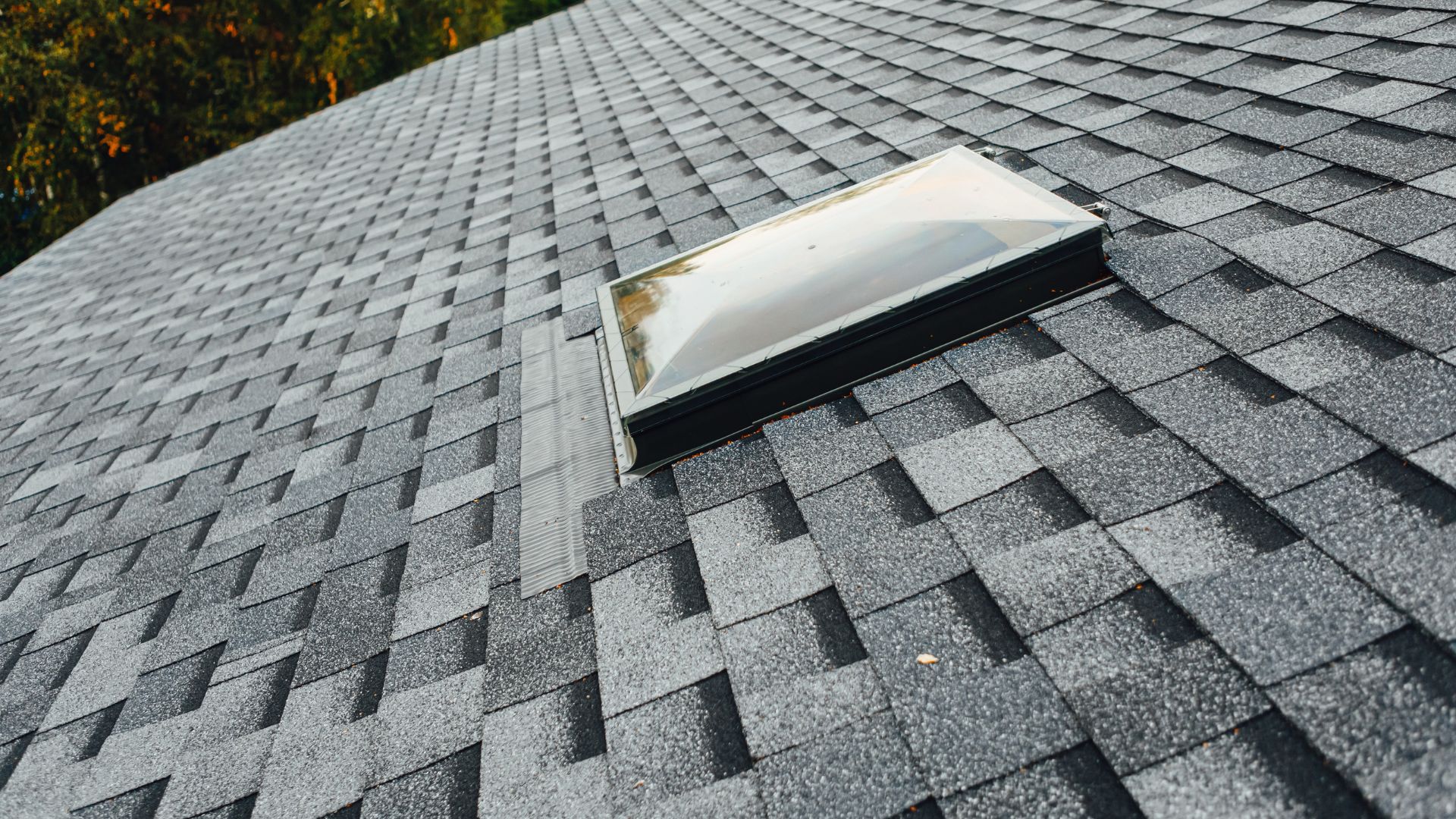 A roof that has a window on top of it