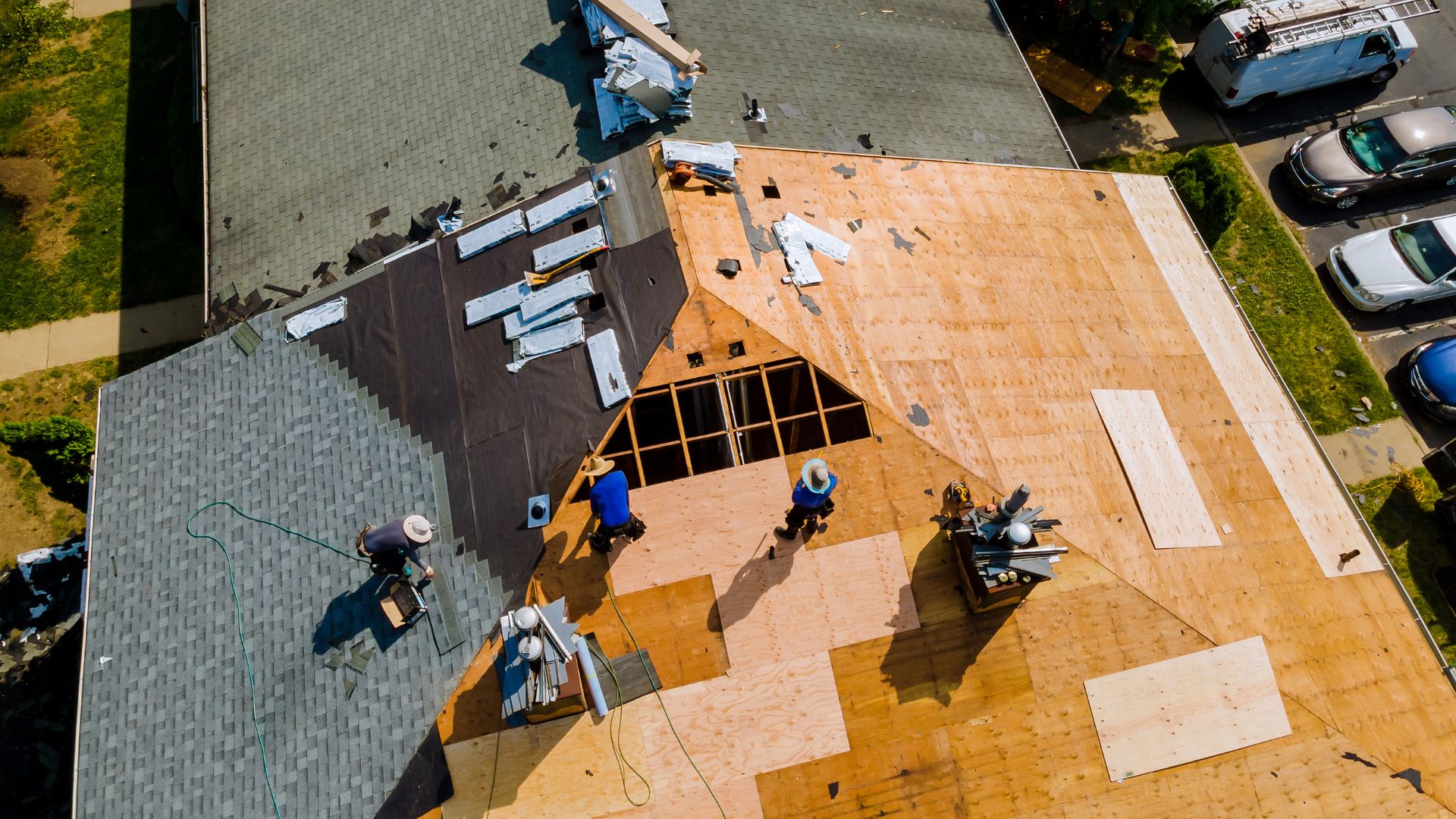 A group of men working on a roof